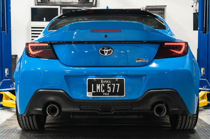 OLM Scythe Style Tail Lights installed on neptune blue 2022 Toyota GR86 with running light
