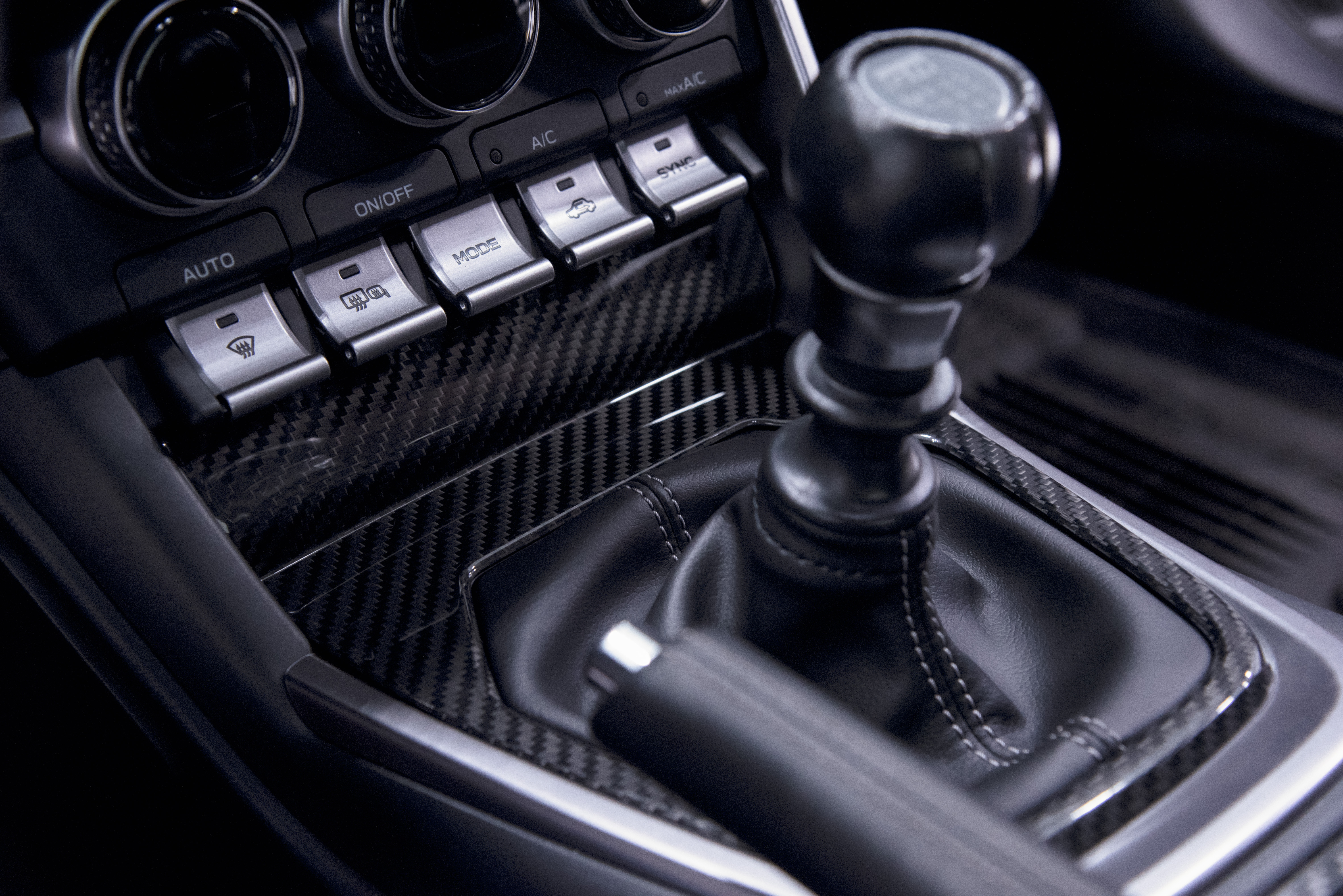 OLM LE Dry Carbon Fiber Shift Panel Trim for Manual Transmissions Installed on a 2022 Toyota GR86 